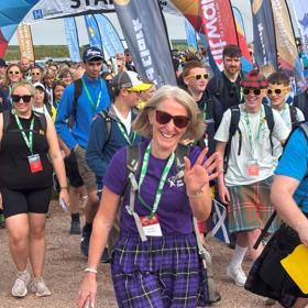 Woman Waves On Kiltwalk