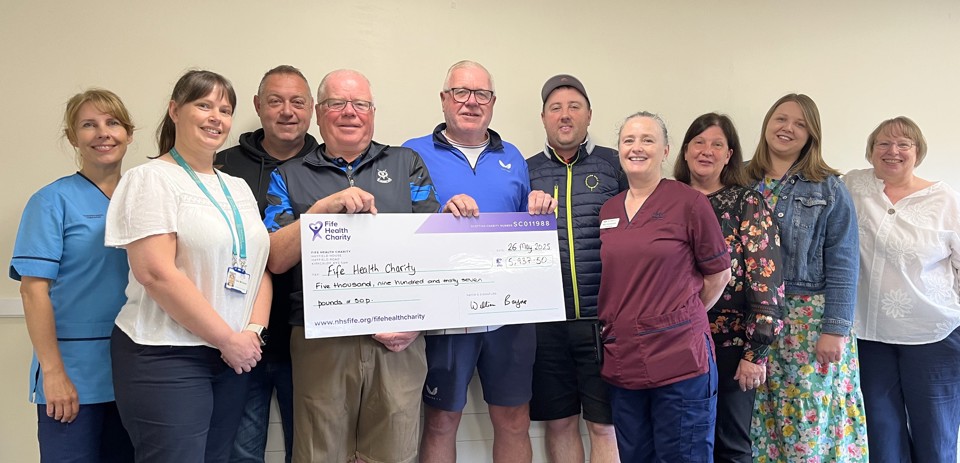 Group shot of cheque handover